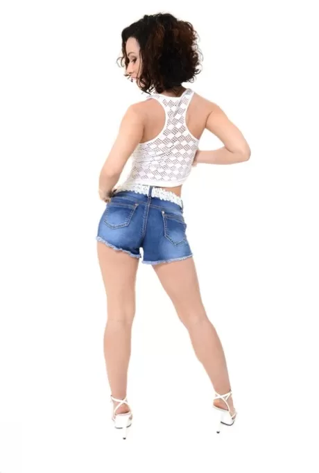 Соло-девушка Пэмми Ли обнажает свои красивые сиськи во время исполнения стриптиза картинка 3